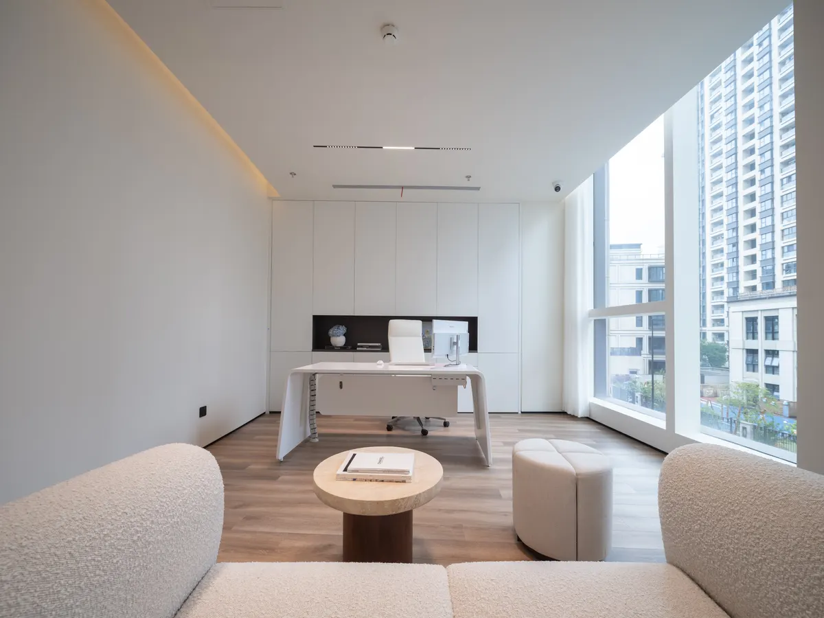 Consultation room with floor-to-ceiling city views